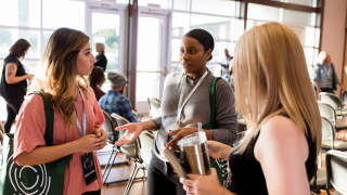 If this is a stock image, the appropriate alt text would be, “Three people chat during a networking event.” If the person creating the alt text knows the event but not the people the appropriate alt text would be, “Three people chat at the Nonprofit Leadership Networking event at the 2022 Leadership Conference.” If the person creating the alt text knows the people and the event, those details should be added to the alt text.